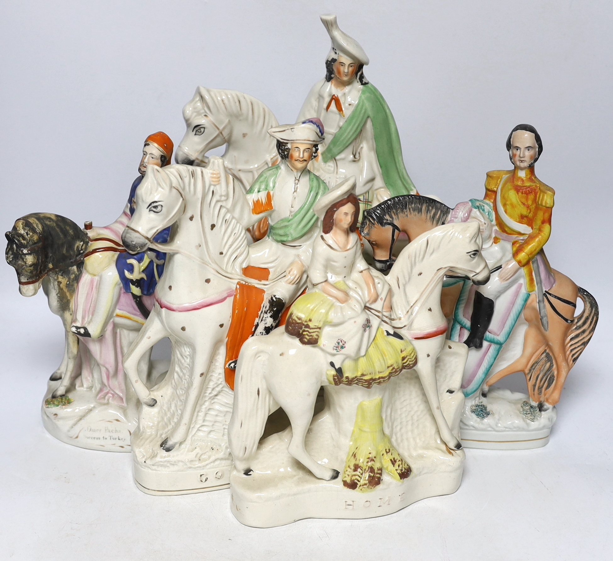 Five large Staffordshire pottery mounted equestrian groups, tallest 36cm
